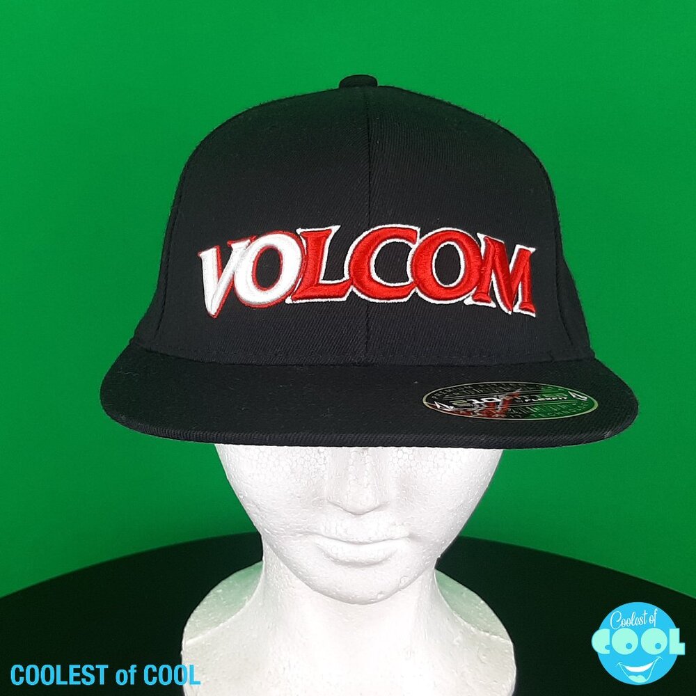 The Volcom Spellout Flexfit Fitted Hat in size S/M (6 7/8 - 7 1/4) is a black an